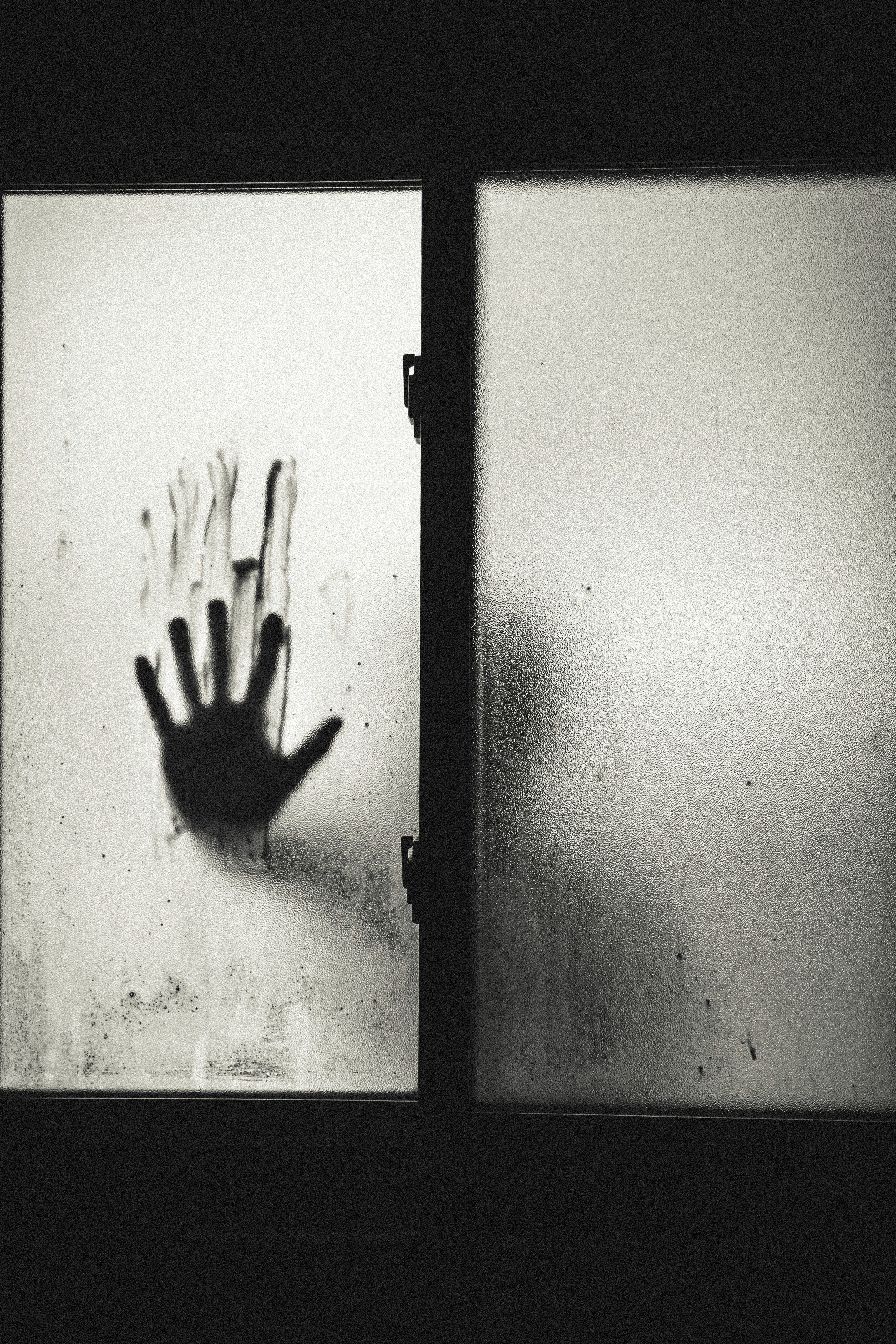 hand silhouette of victim a violent crime -victim in the shower